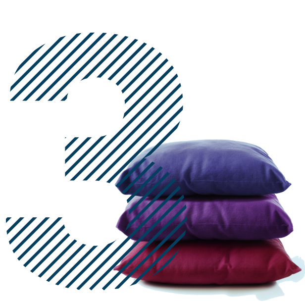 Ridicați picioarele pentru a îmbunătăți circulația sângelui, reprezentată de un teanc de 3 perne